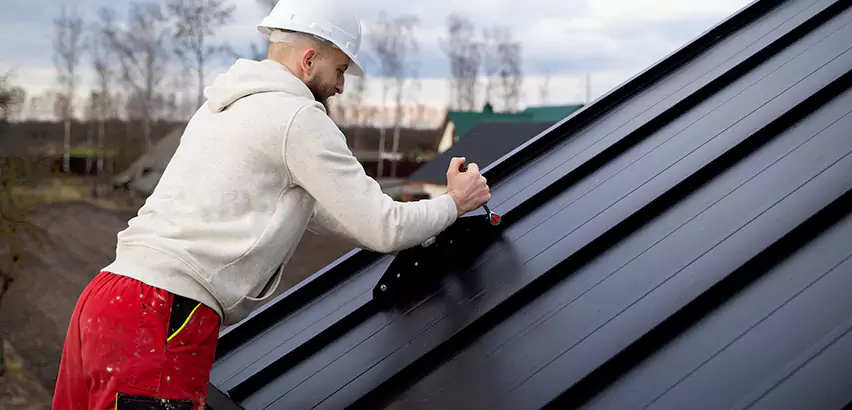 Tin Roof Ridge Cap Installation in La Jolla